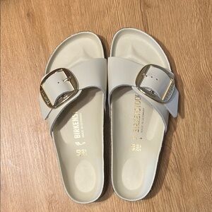 Birkenstock Cream Sandals with Gold Buckle